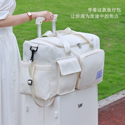 新款大容量手提肩带防水行李包可套拉杆收纳行李袋旅行包多层收纳图3
