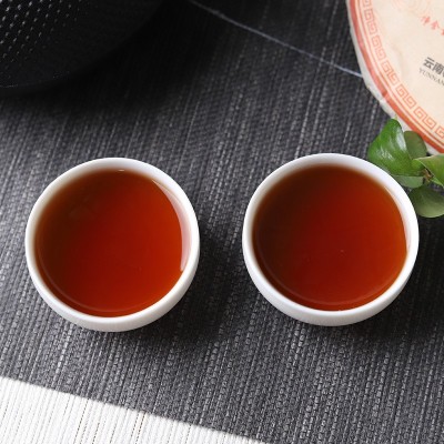 厂家批发老树乔木云南勐海古树普洱饼茶357g七子饼熟普紧压熟茶图3